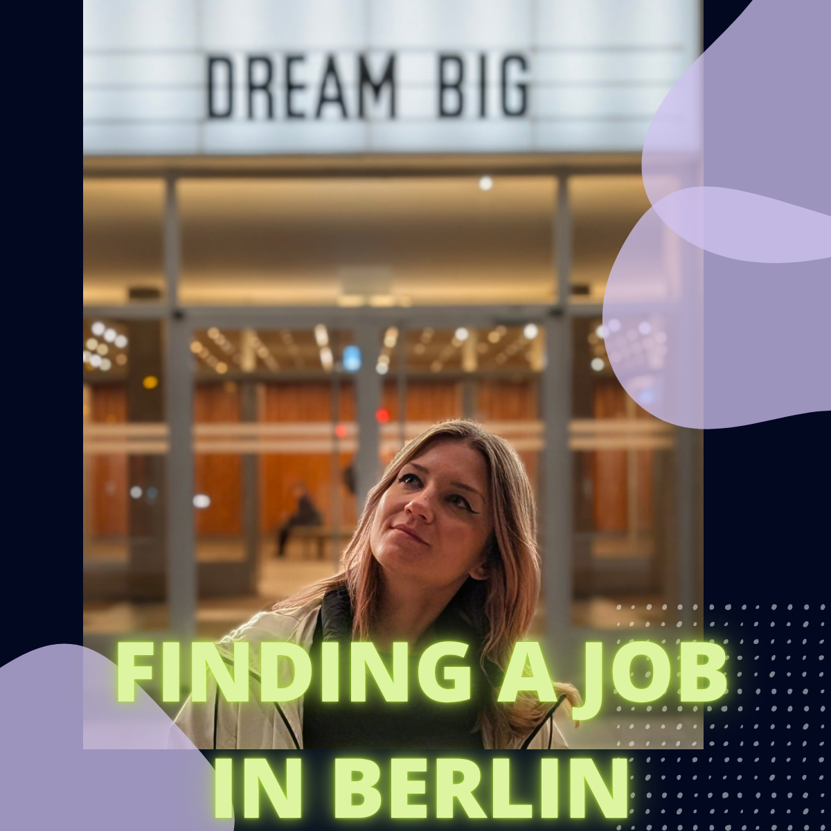 Woman looking up at Dream Big sign - finding a job in Berlin guide for international professionals